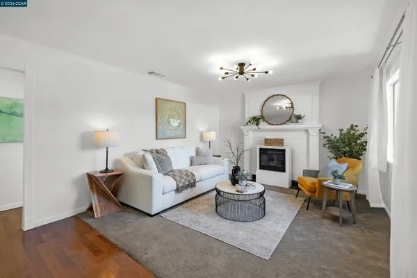 a spacious bedroom with a bed and a chair