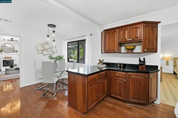 a view of a patio with wooden floor