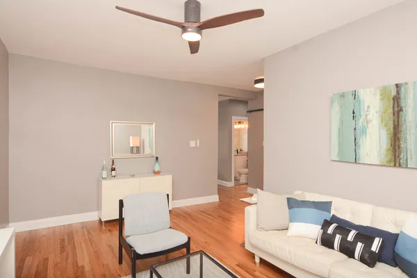 a living room with furniture and a table