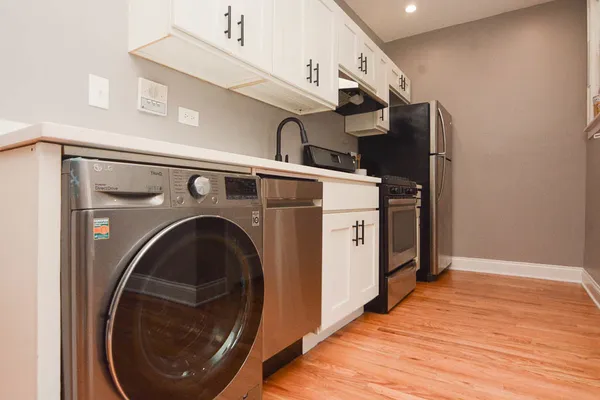 a utility room with dryer and washer