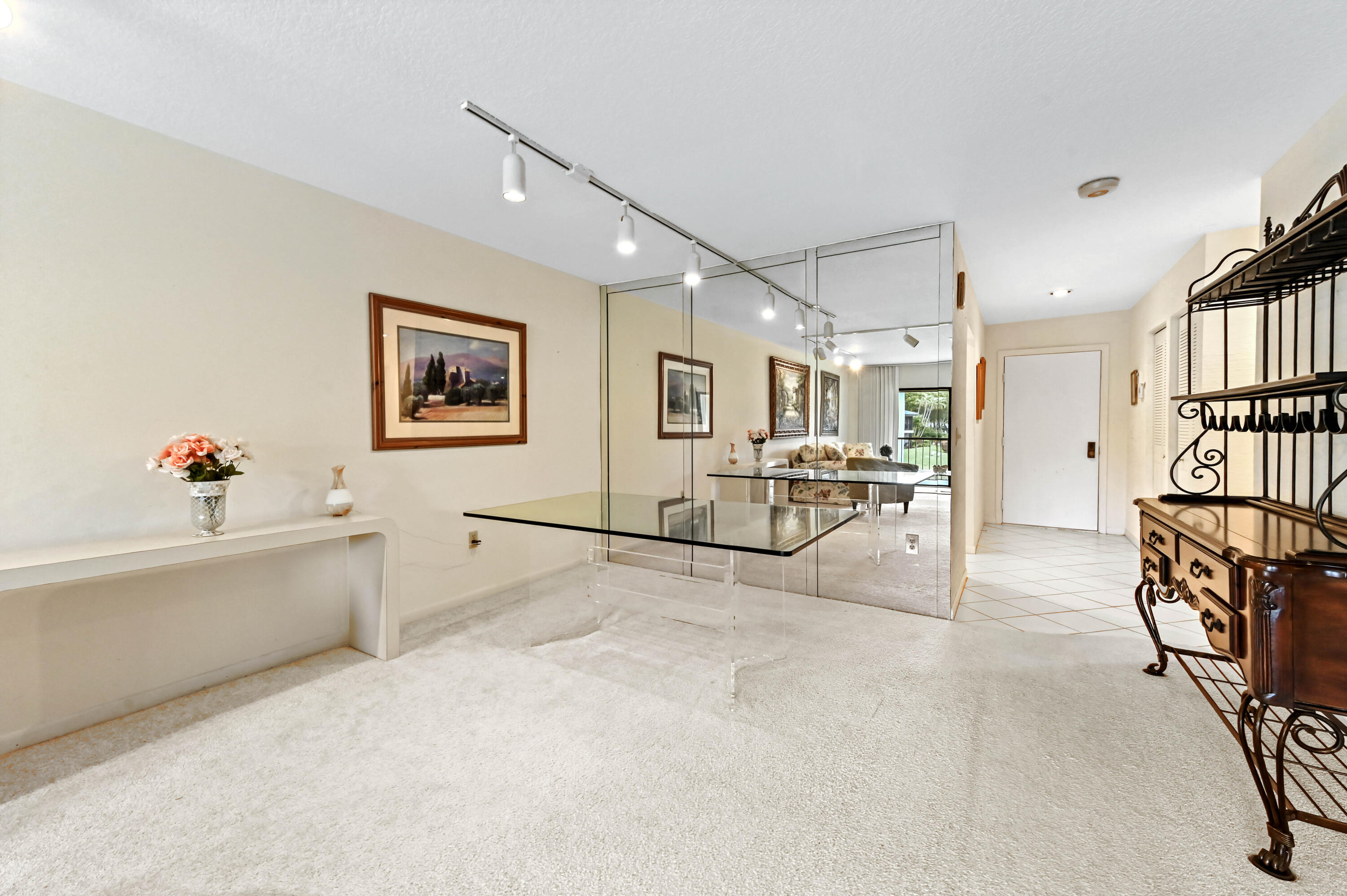 33 Southport Lane, Unit D Boynton Beach, FL 33436 - Photo 24 of 42 a view of a livingroom with furniture and a ceiling fan