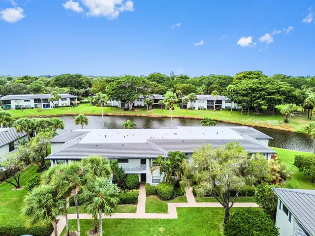 a view of a garden with a lake view