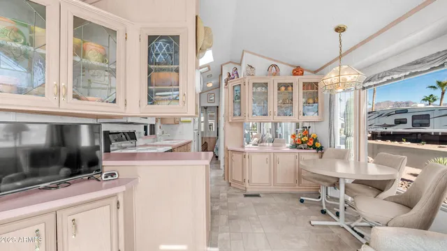 a kitchen with a stove and a sink