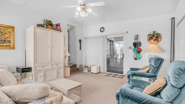 a view of dinning table and chairs in patio
