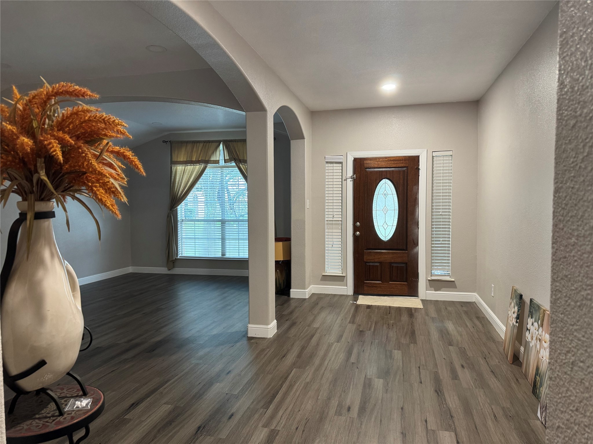 9431 Water Edge Point Lane Humble, TX 77396 - Photo 2 of 16 wooden floor in an empty room with a window