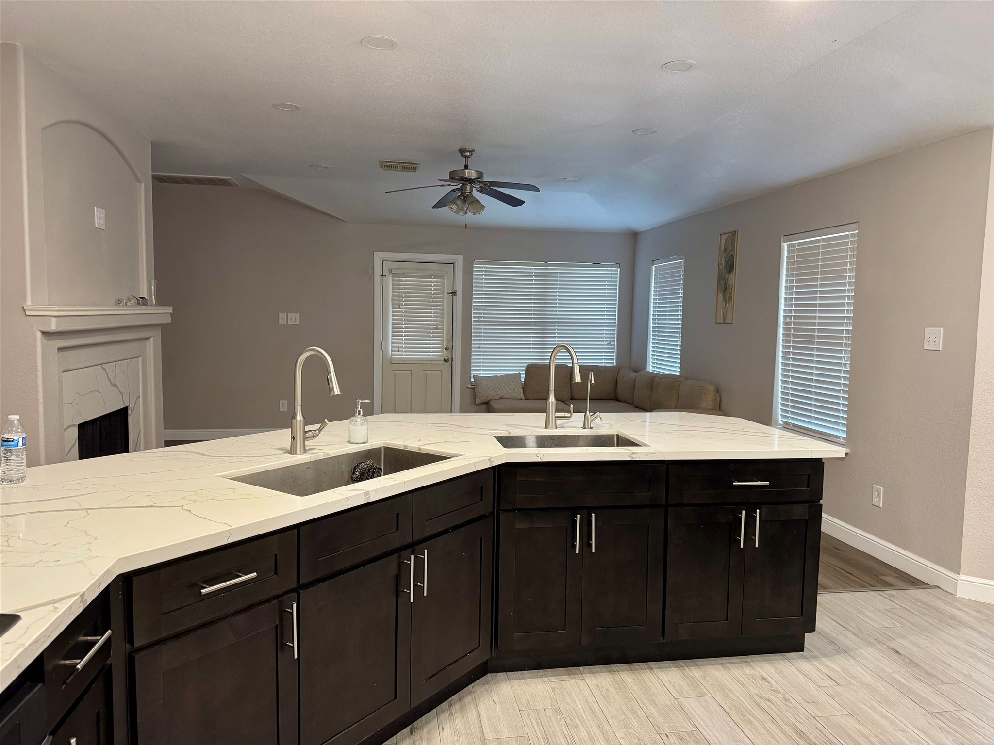 9431 Water Edge Point Lane Humble, TX 77396 - Photo 4 of 16 a kitchen with a sink and cabinets