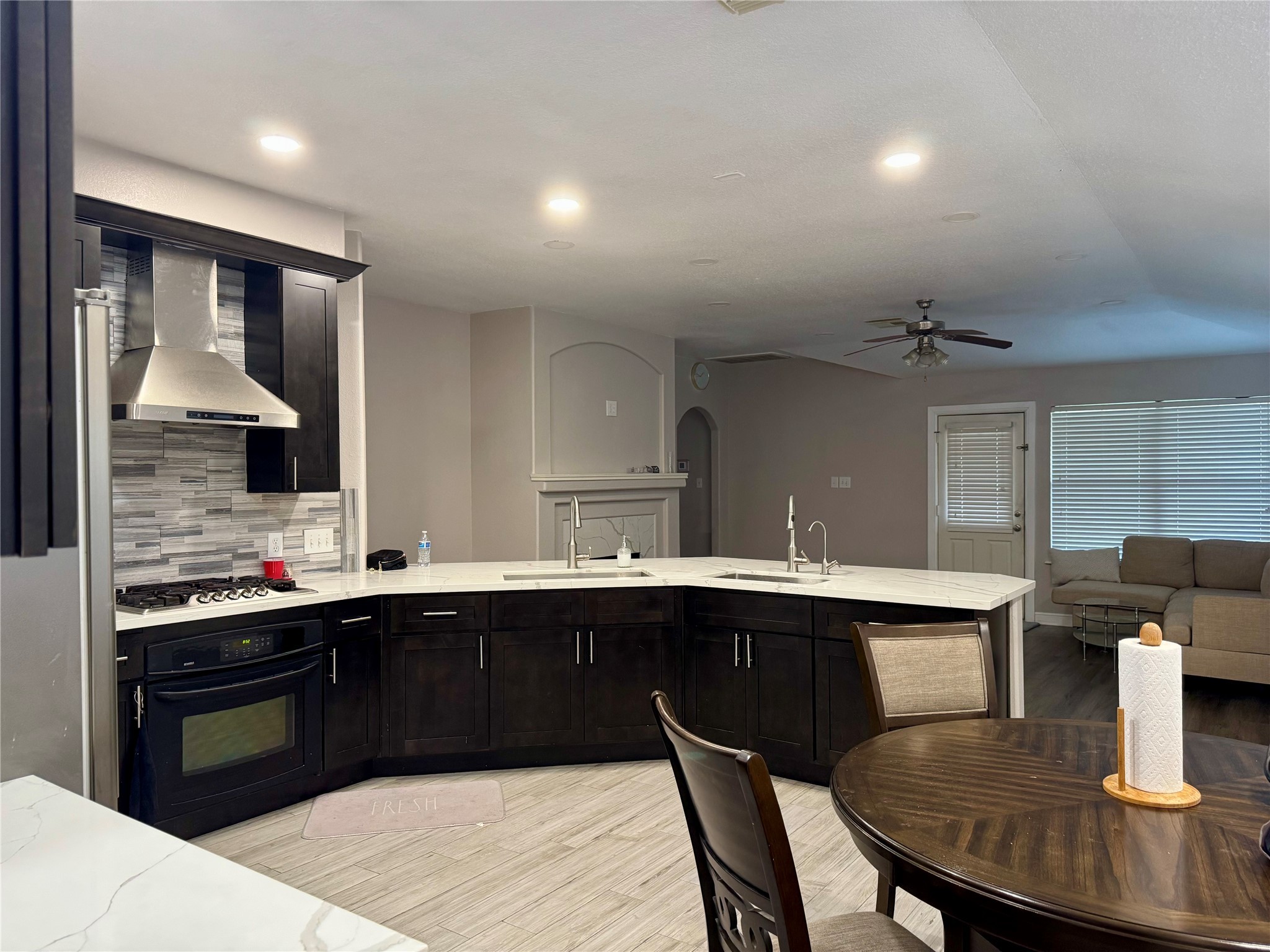9431 Water Edge Point Lane Humble, TX 77396 - Photo 5 of 16 a kitchen with a sink and cabinets