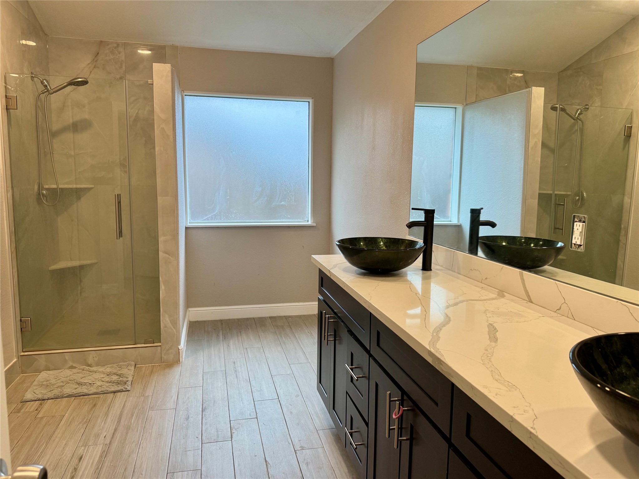 9431 Water Edge Point Lane Humble, TX 77396 - Photo 8 of 16 a kitchen with a sink and cabinets