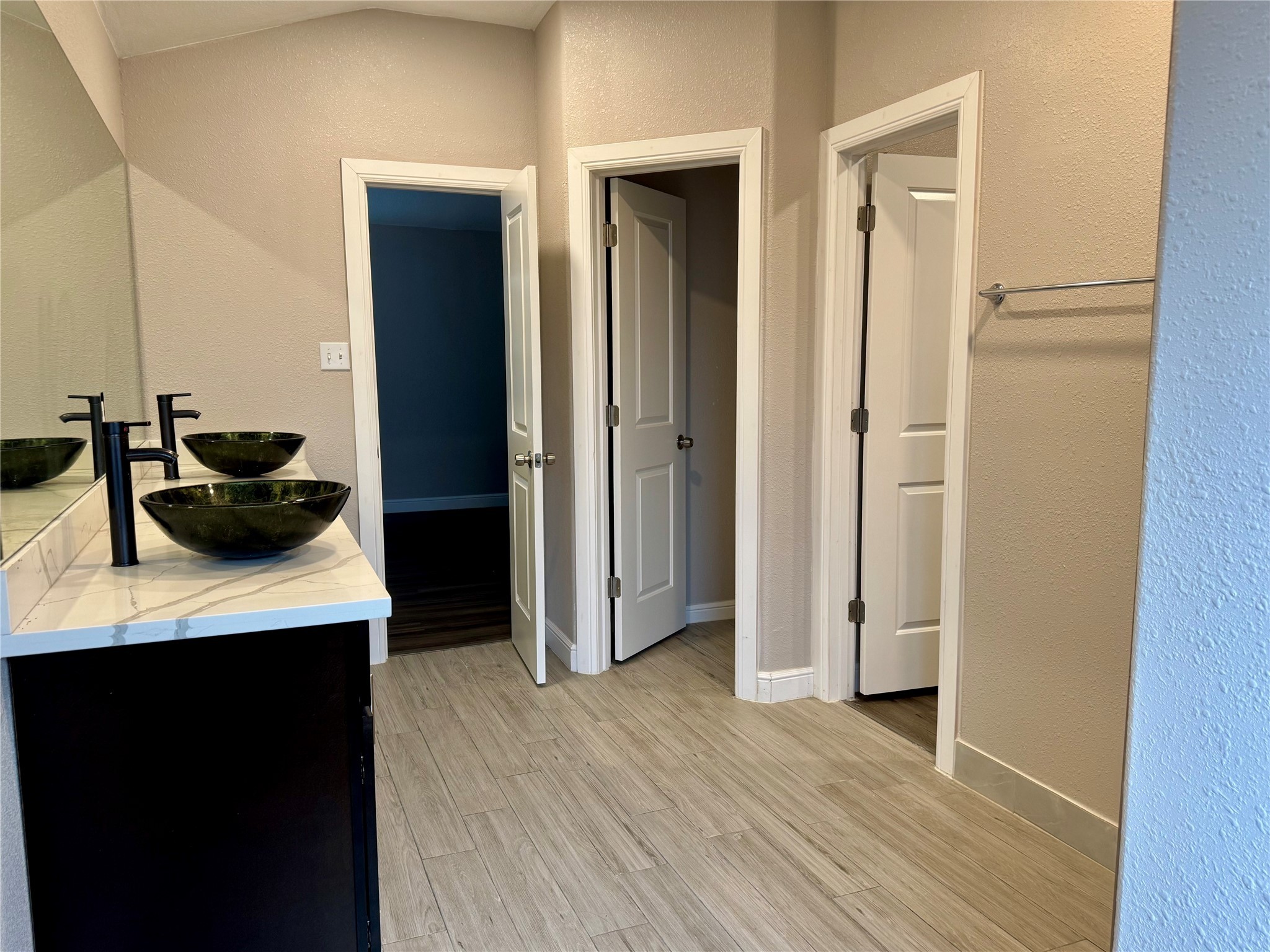 9431 Water Edge Point Lane Humble, TX 77396 - Photo 9 of 16 a kitchen with a refrigerator and a stove top oven