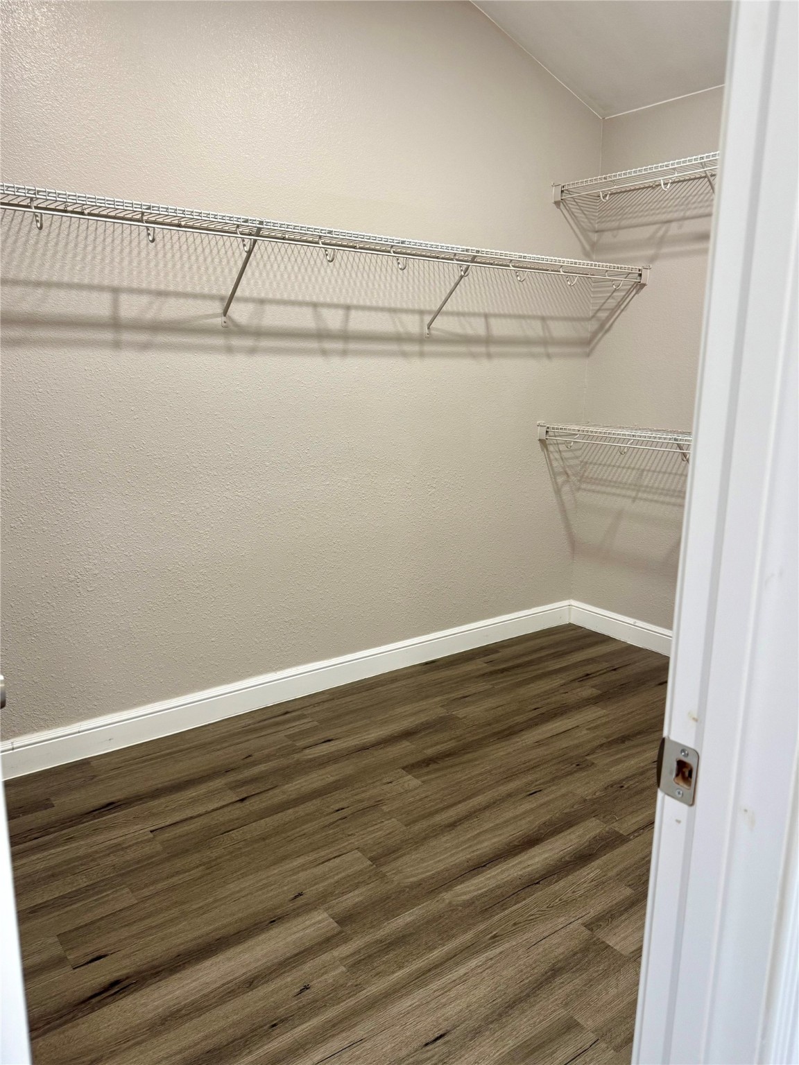 9431 Water Edge Point Lane Humble, TX 77396 - Photo 10 of 16 a view of an empty walk in closet