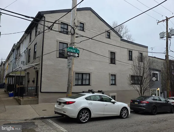 a car parked in front of a building