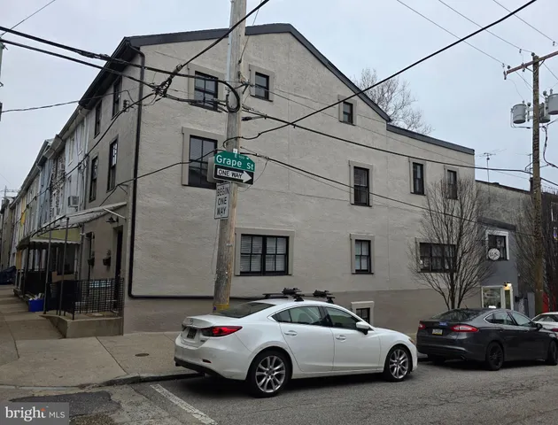 a car parked in front of a building