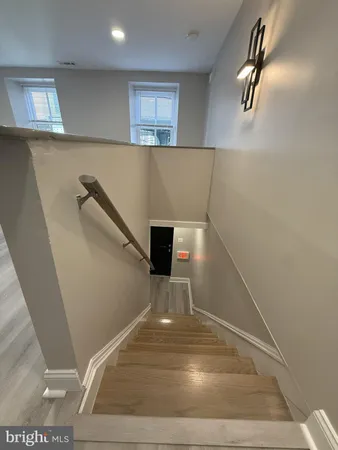 a view of a car parked in front of a house