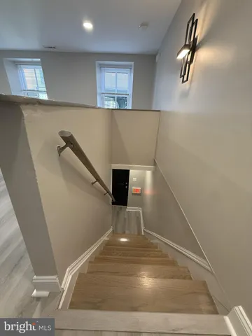 a view of a car parked in front of a house