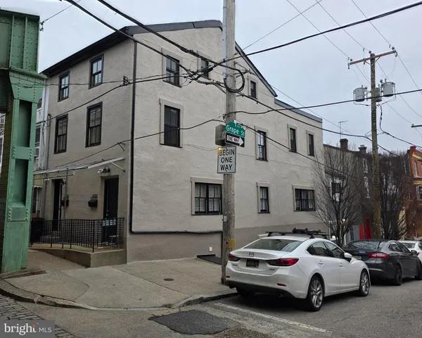 a car parked in front of a house