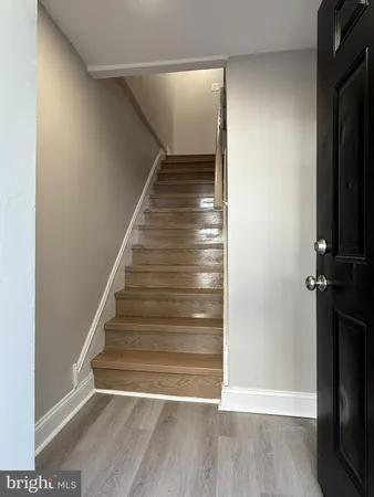 a view of entryway with wooden floor