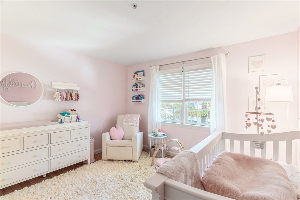 1975 Middlesex Street, Unit 2 Lowell, MA 01851 - Photo 17 of 31 a living room with furniture and a window