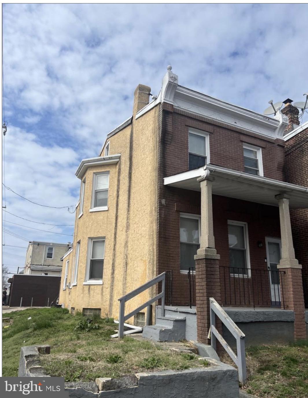 6700 Marsden Street Philadelphia, PA 19135 - Photo 1 of 7 a front view of a house with garden
