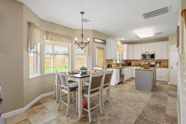 a view of a dining room and livingroom