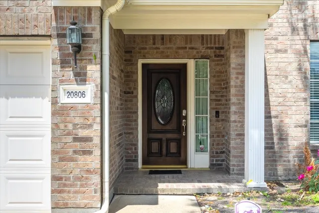 a front view of a house with entrance