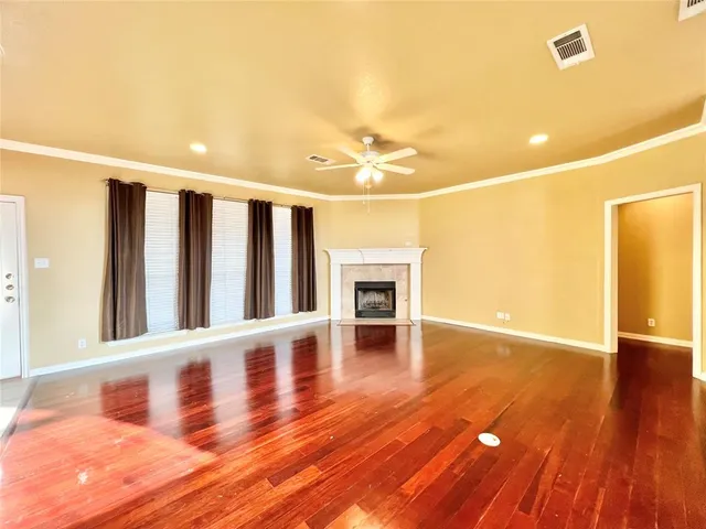 a view of a livingroom with wooden floor