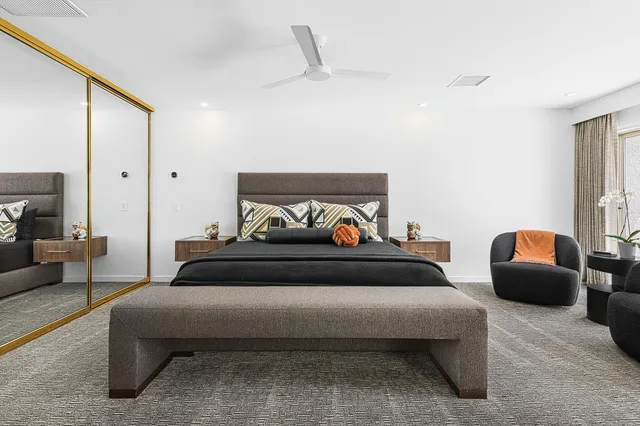 a bathroom with double vanity sinks double vanity and a shower