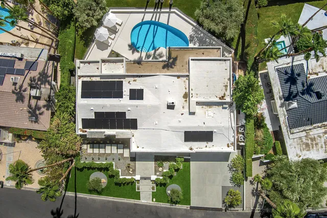 a bed room with a bed and a lamp