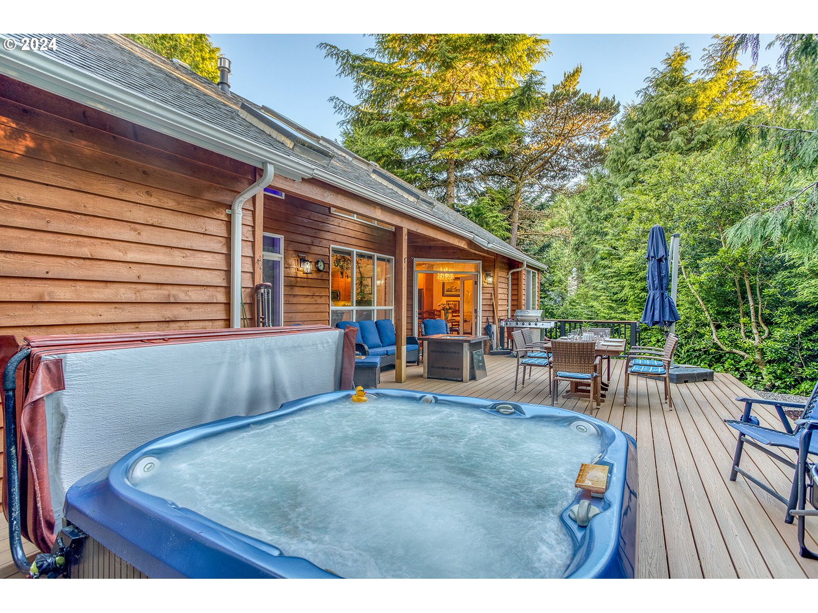 115 Southwest Cormorant Depoe Bay, OR 97341 - Photo 13 of 47 a view of a patio with chairs and tables