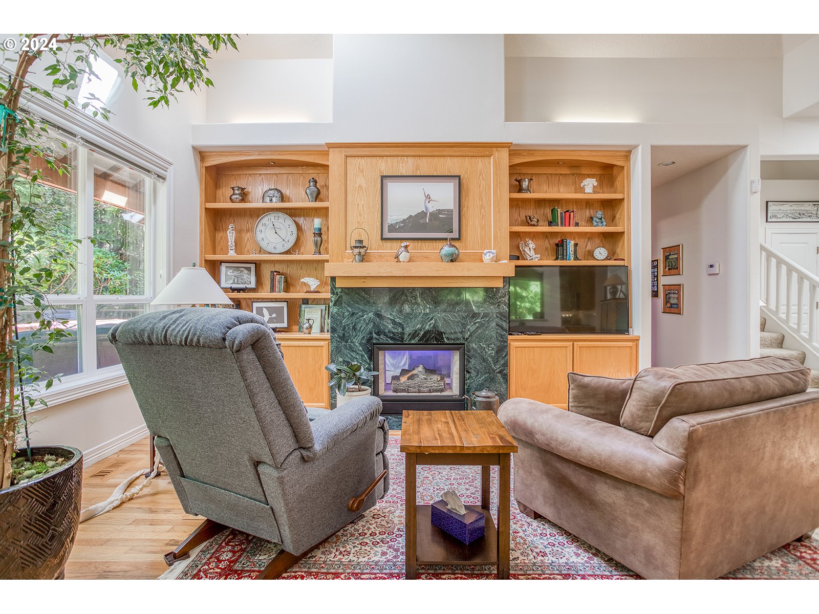 115 Southwest Cormorant Depoe Bay, OR 97341 - Photo 19 of 47 a living room with furniture a fireplace and a large window