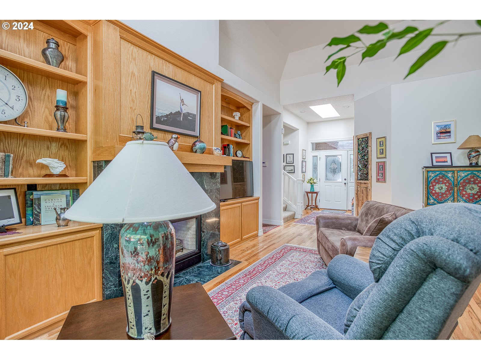 115 Southwest Cormorant Depoe Bay, OR 97341 - Photo 20 of 47 a living room with furniture and a wooden floor