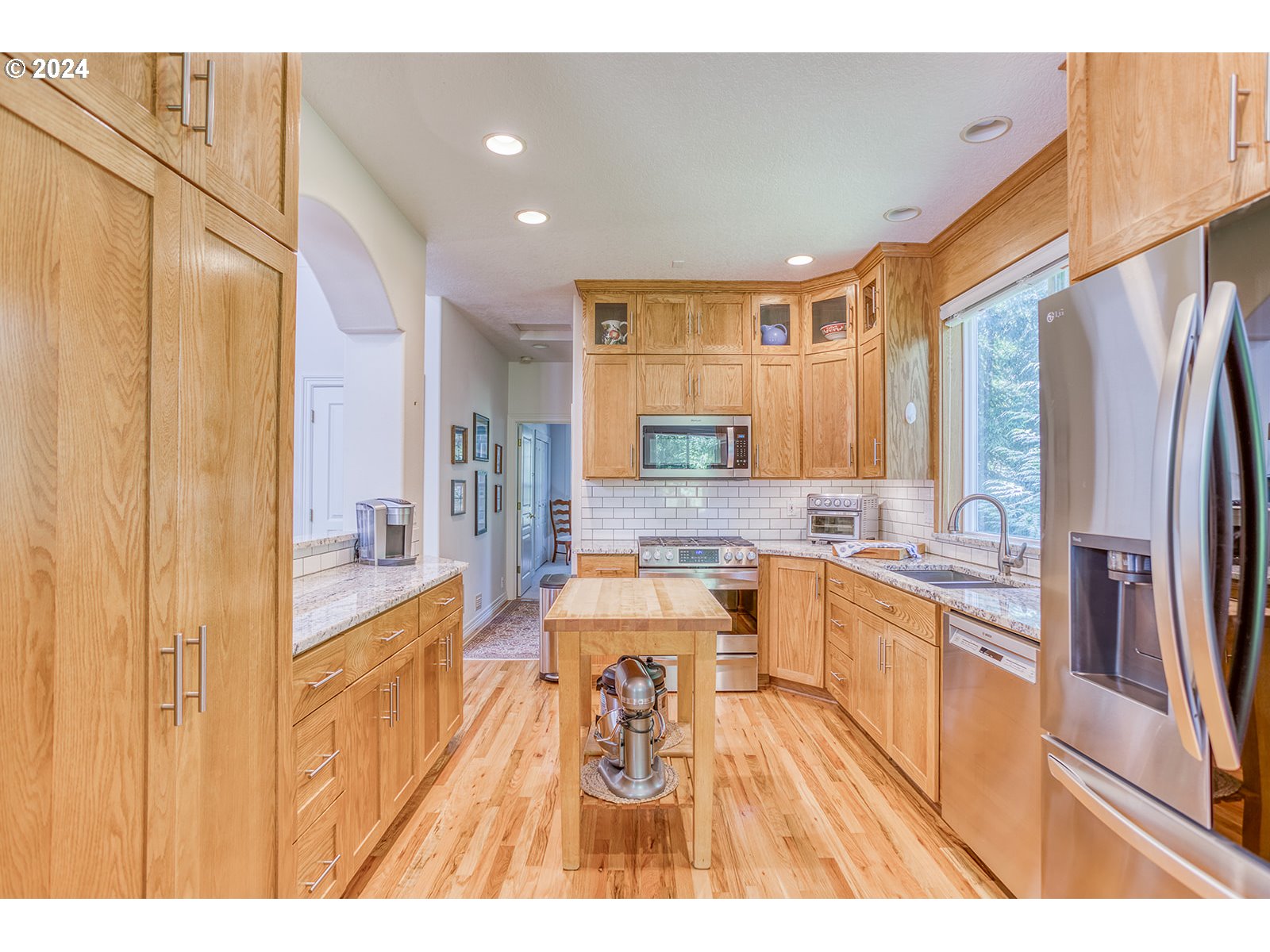 115 Southwest Cormorant Depoe Bay, OR 97341 - Photo 25 of 47 a large white kitchen with a large window