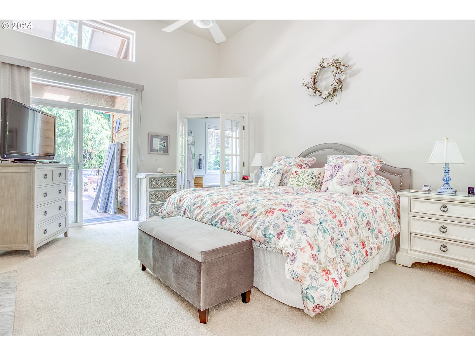 115 Southwest Cormorant Depoe Bay, OR 97341 - Photo 29 of 47 a spacious bedroom with a bed and a window