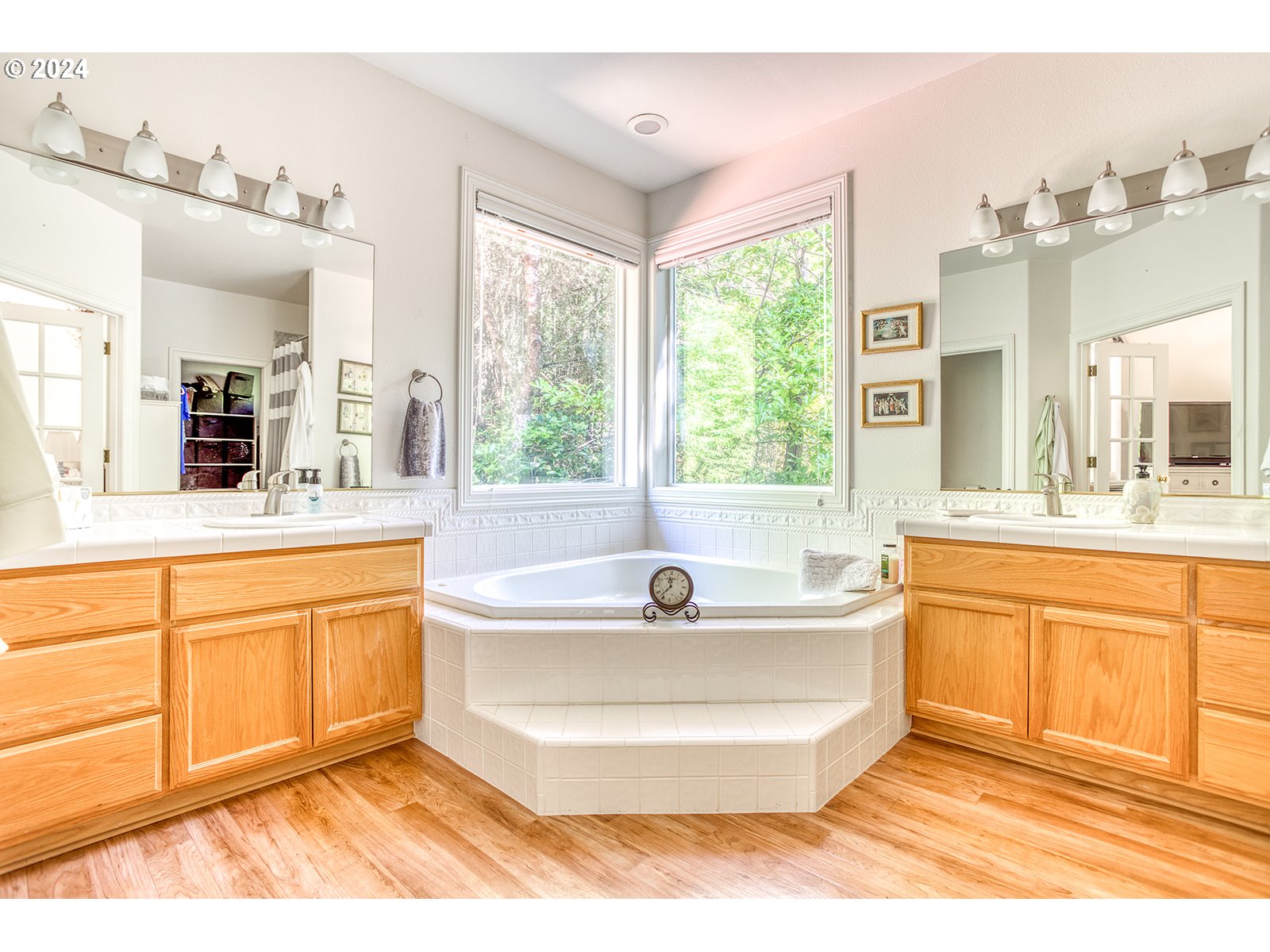 115 Southwest Cormorant Depoe Bay, OR 97341 - Photo 32 of 47 a spacious bathroom with a tub sink and mirror