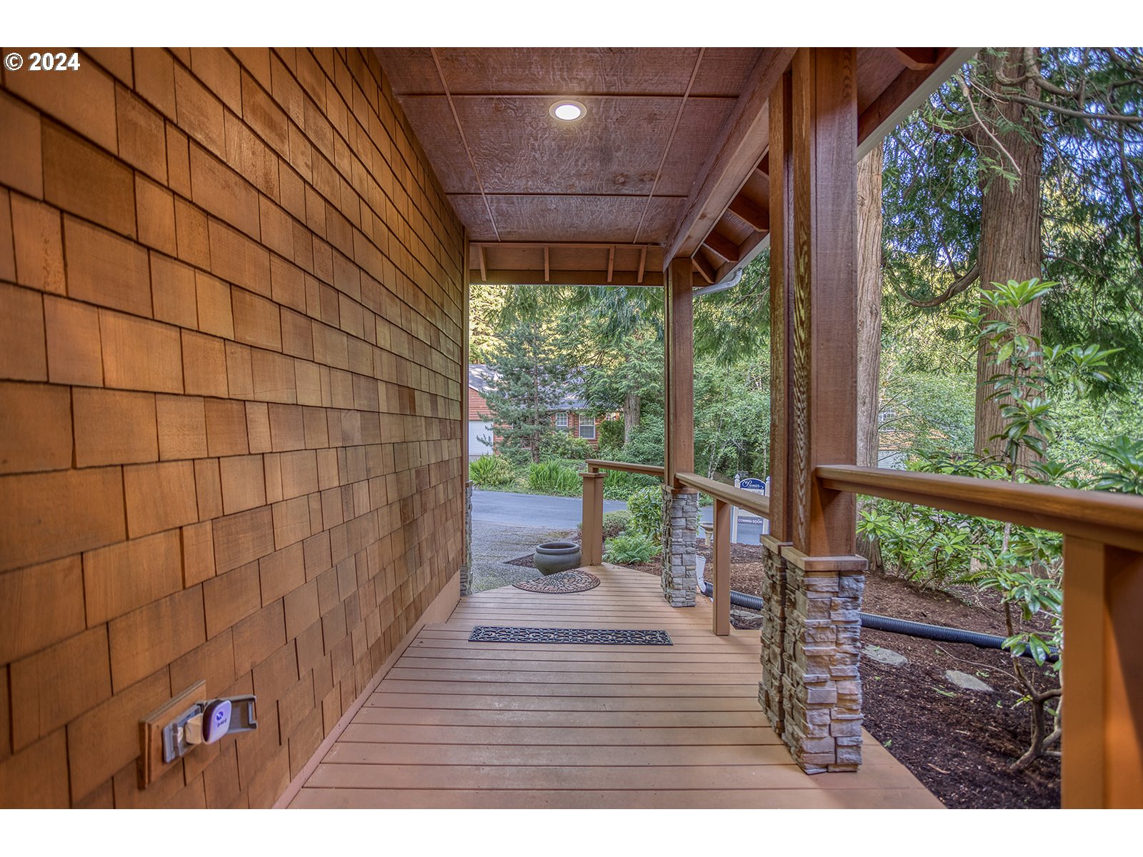 115 Southwest Cormorant Depoe Bay, OR 97341 - Photo 7 of 47 a view of a porch with wooden floor