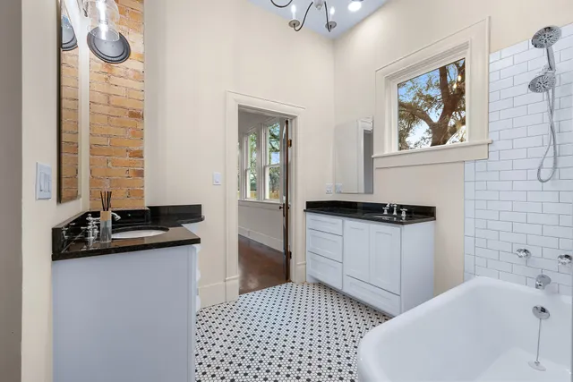 a front view of a house with a yard and porch