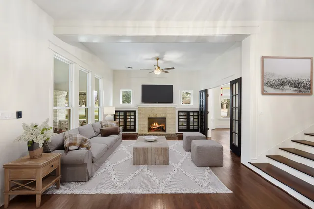a kitchen with a stove a refrigerator and a cabinets