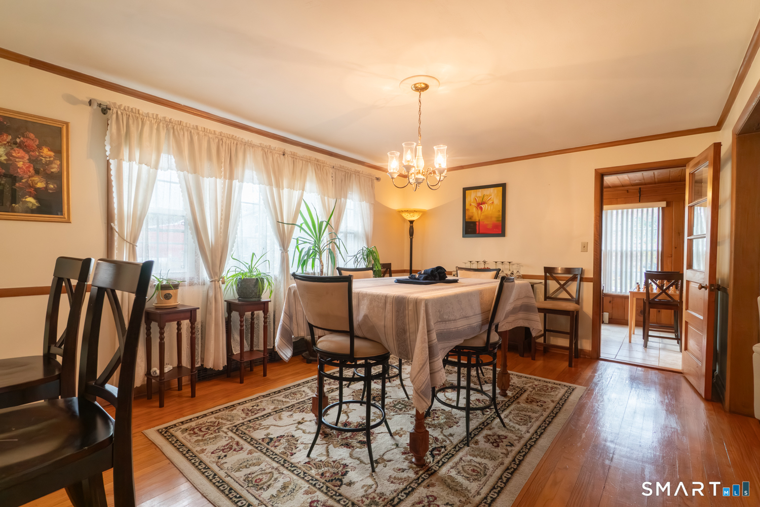 224 Ray Road New Haven, CT 06515 - Photo 12 of 37 a view of a dining room with furniture window and wooden floor