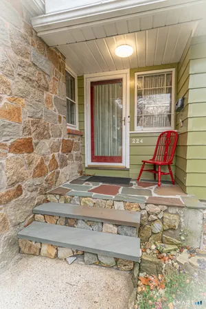 a bench sitting in front of a building