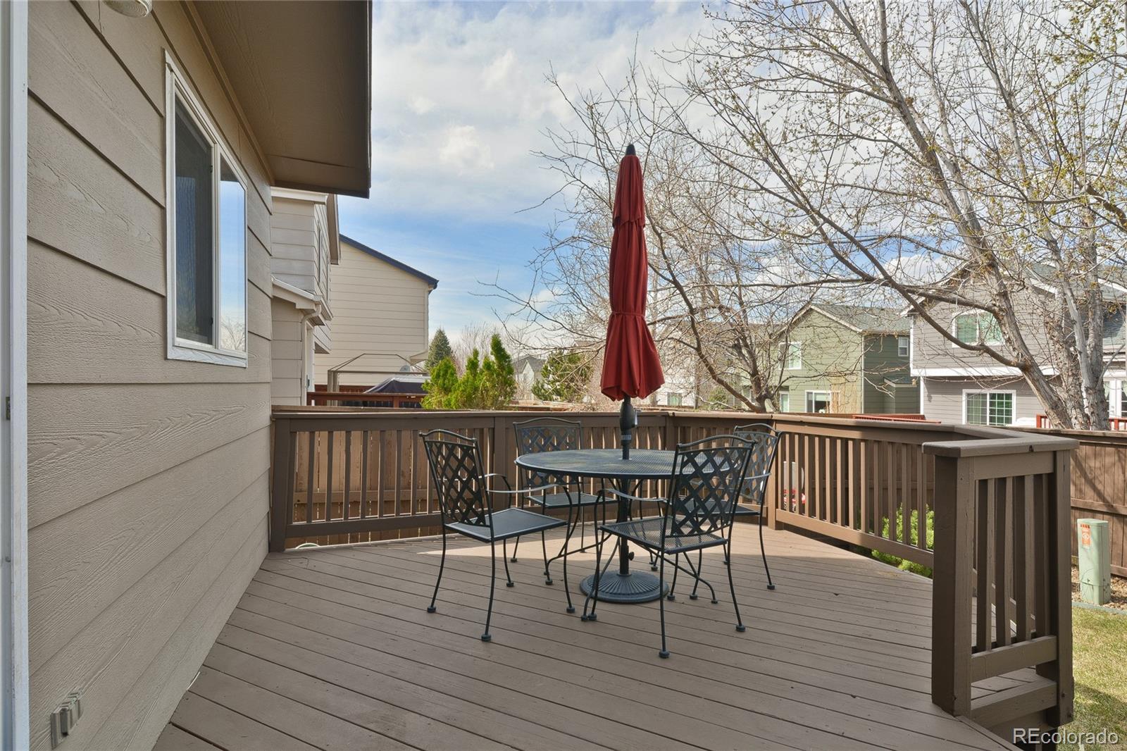 1165 Timbervale Trail Highlands Ranch, CO 80129 - Photo 26 of 29 a view of a chairs on the roof deck