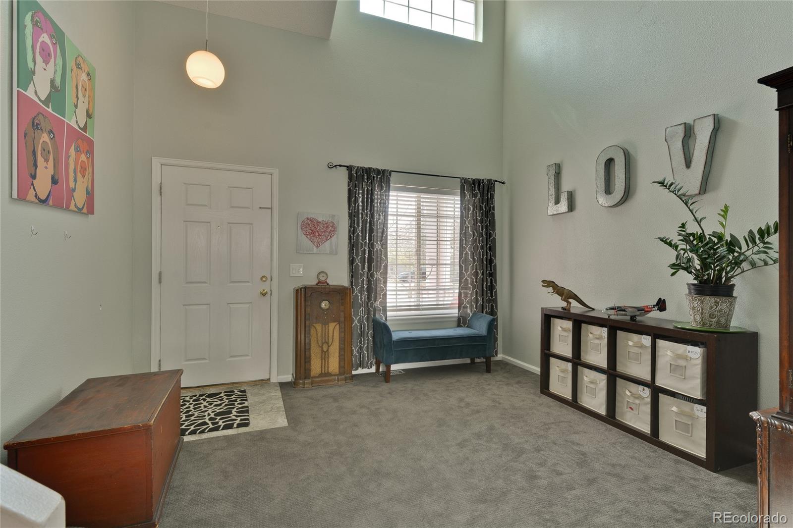 1165 Timbervale Trail Highlands Ranch, CO 80129 - Photo 5 of 29 a view of livingroom with furniture