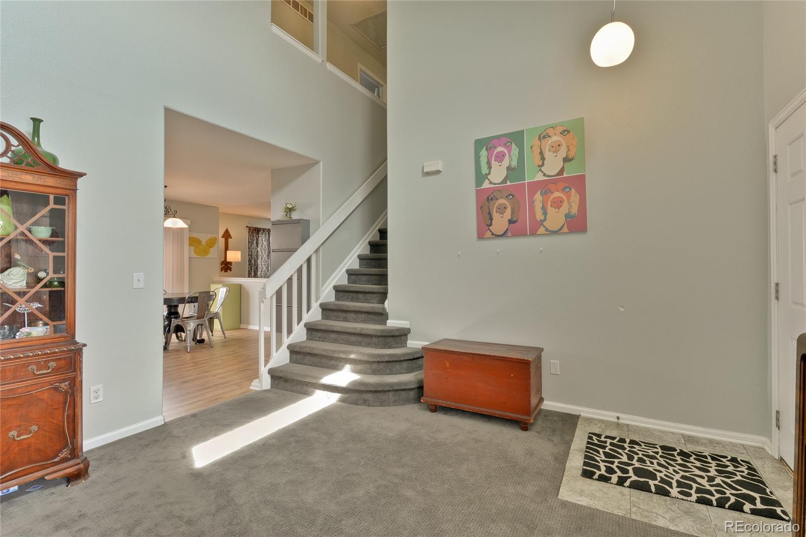1165 Timbervale Trail Highlands Ranch, CO 80129 - Photo 6 of 29 a view of an empty room and stairs