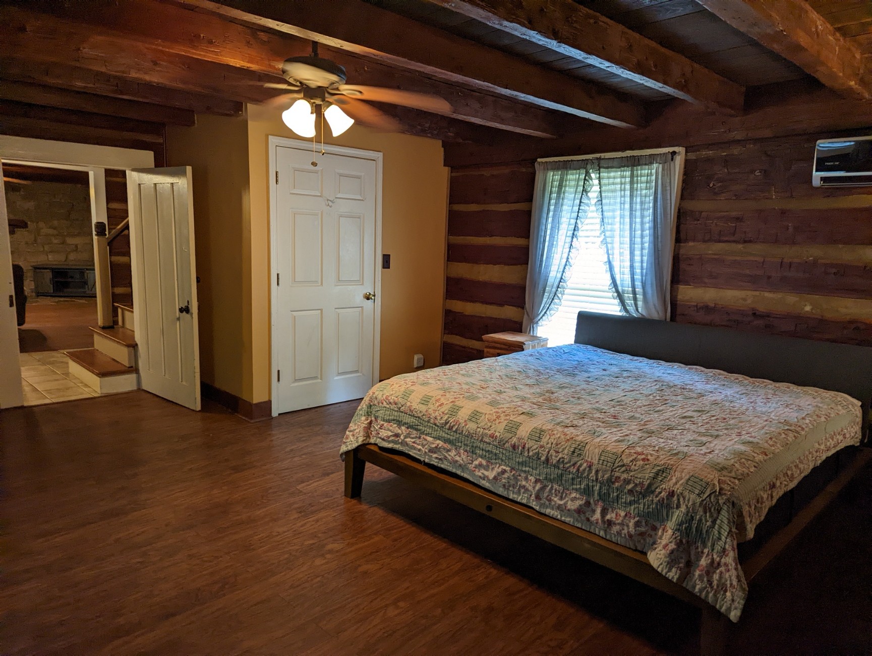 4747 Jones Road Christiana, TN 37037 - Photo 13 of 29 a bed sitting in a bedroom next to a window and closet
