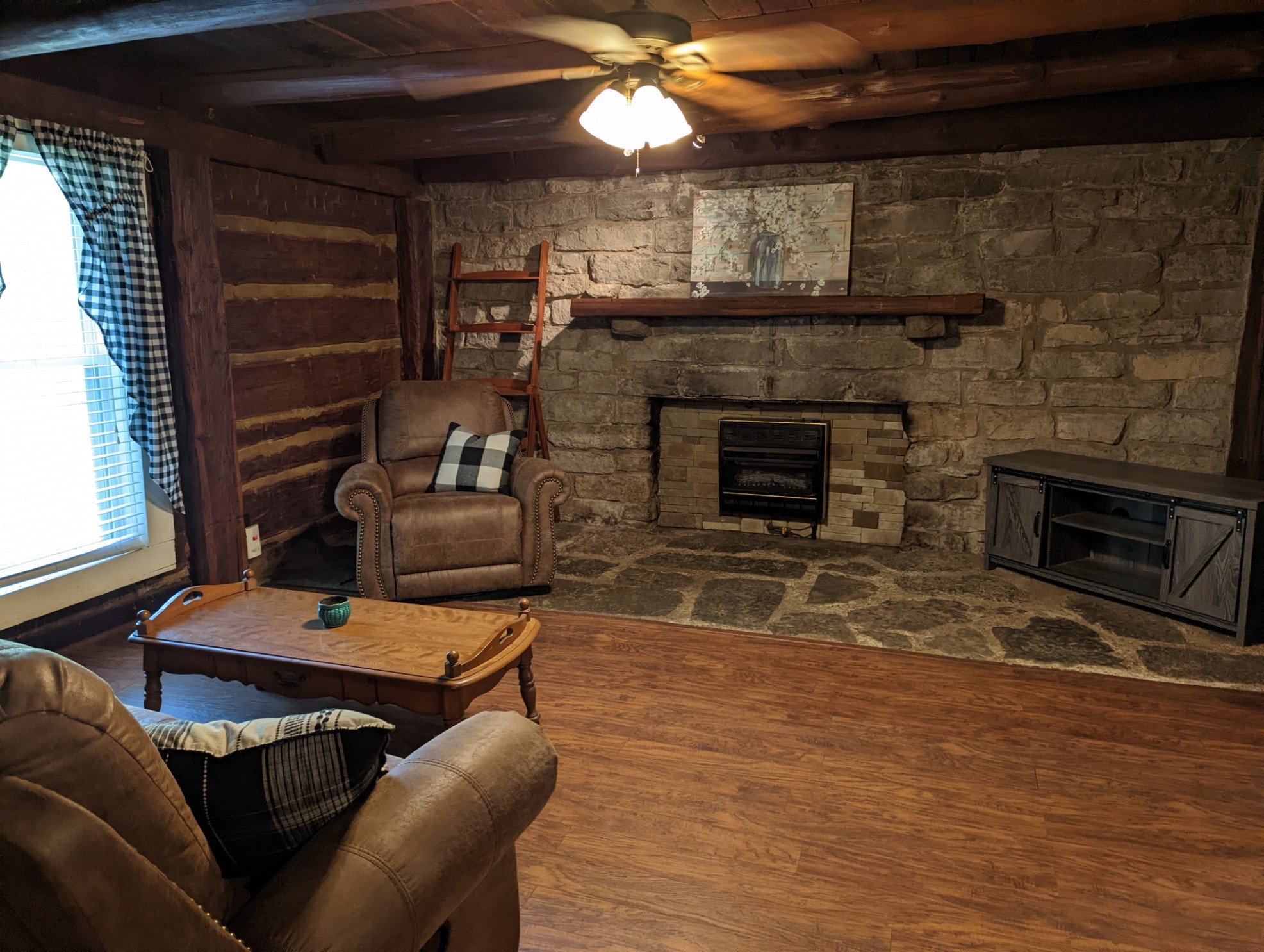 4747 Jones Road Christiana, TN 37037 - Photo 14 of 29 a living room with furniture and a fireplace
