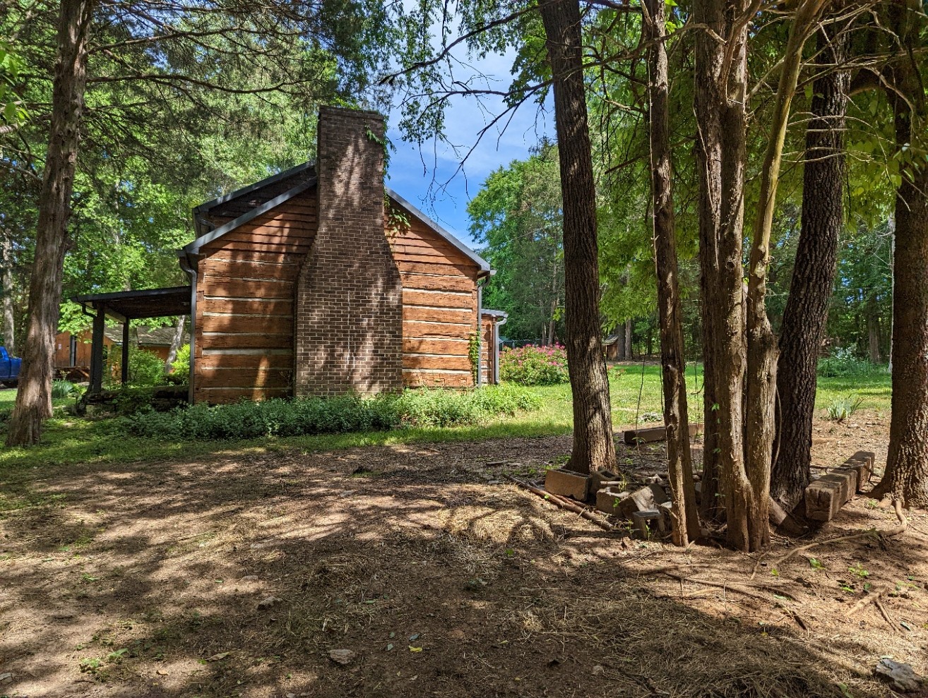 4747 Jones Road Christiana, TN 37037 - Photo 2 of 29 a view of a house with backyard and trees