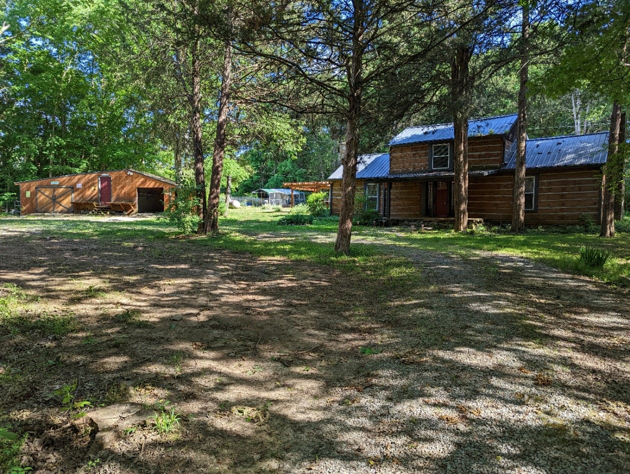 4747 Jones Road Christiana, TN 37037 - Photo 29 of 29 a view of a house with a yard