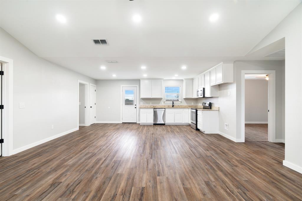19 Private Road Paris, TX 75460 - Photo 7 of 18 a view of kitchen with wooden floor