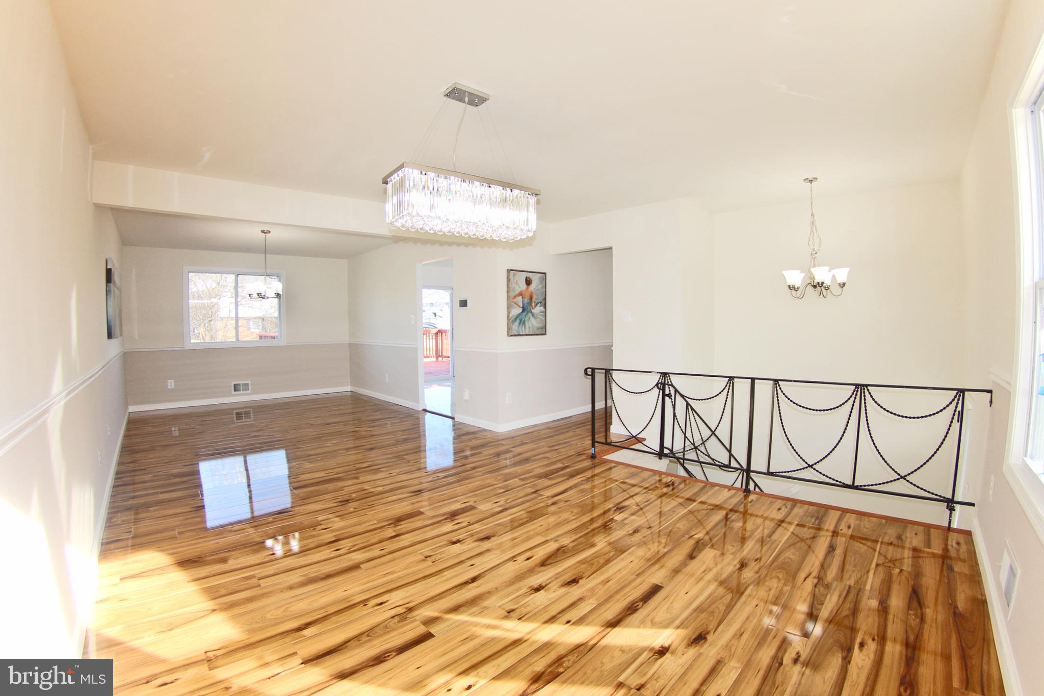 8916 Goldfield Place Clinton, MD 20735 - Photo 11 of 24 a spacious bathroom with a sink and a mirror