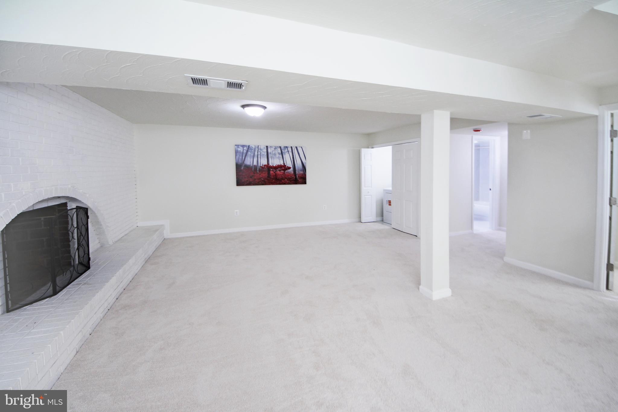 8916 Goldfield Place Clinton, MD 20735 - Photo 19 of 24 a view of a livingroom with wooden floor
