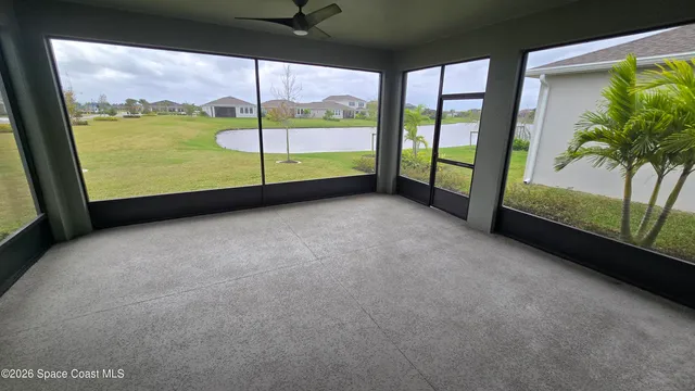 a view of a floor to ceiling window in an empty room