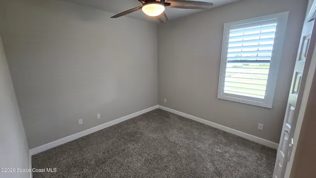 an empty room with window